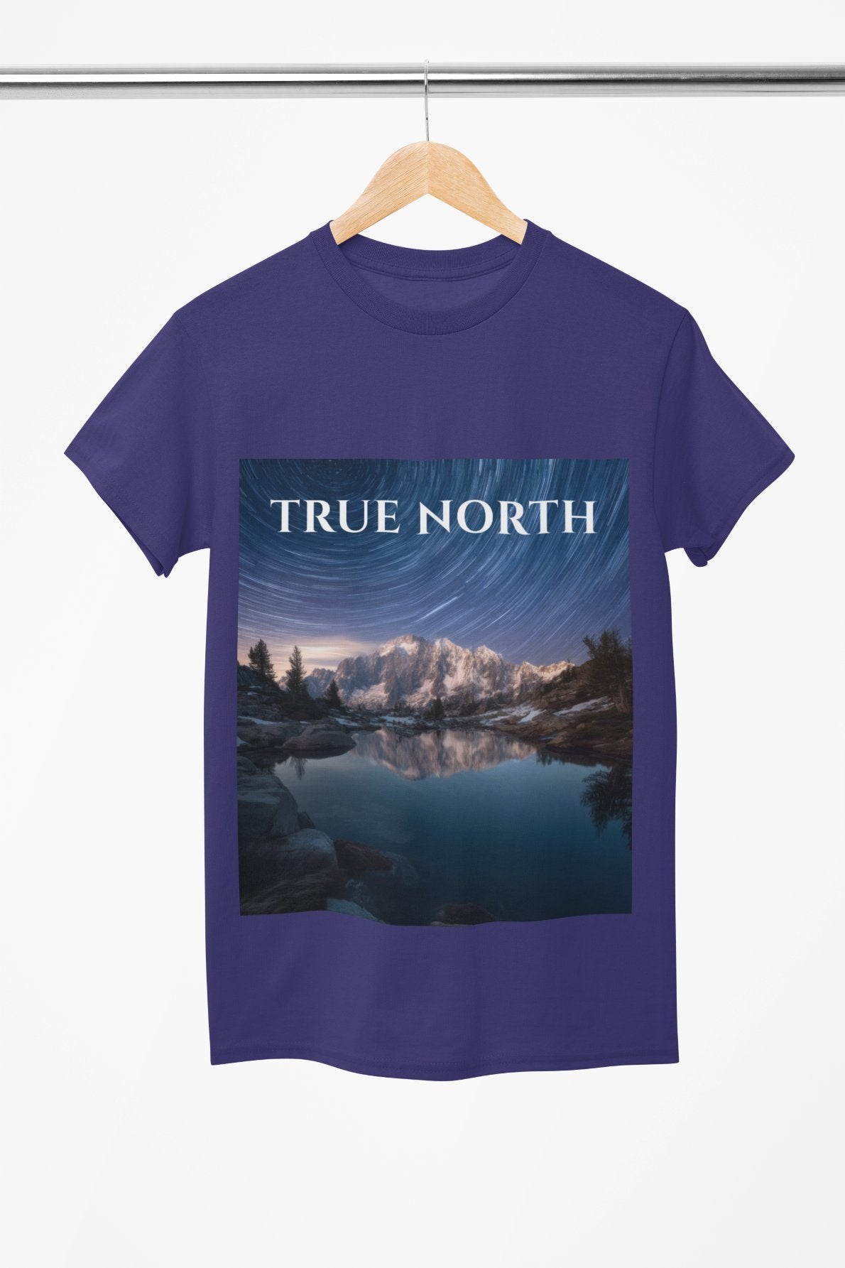 Purple t-shirt with 'True North' graphic design on a hanger against a white background