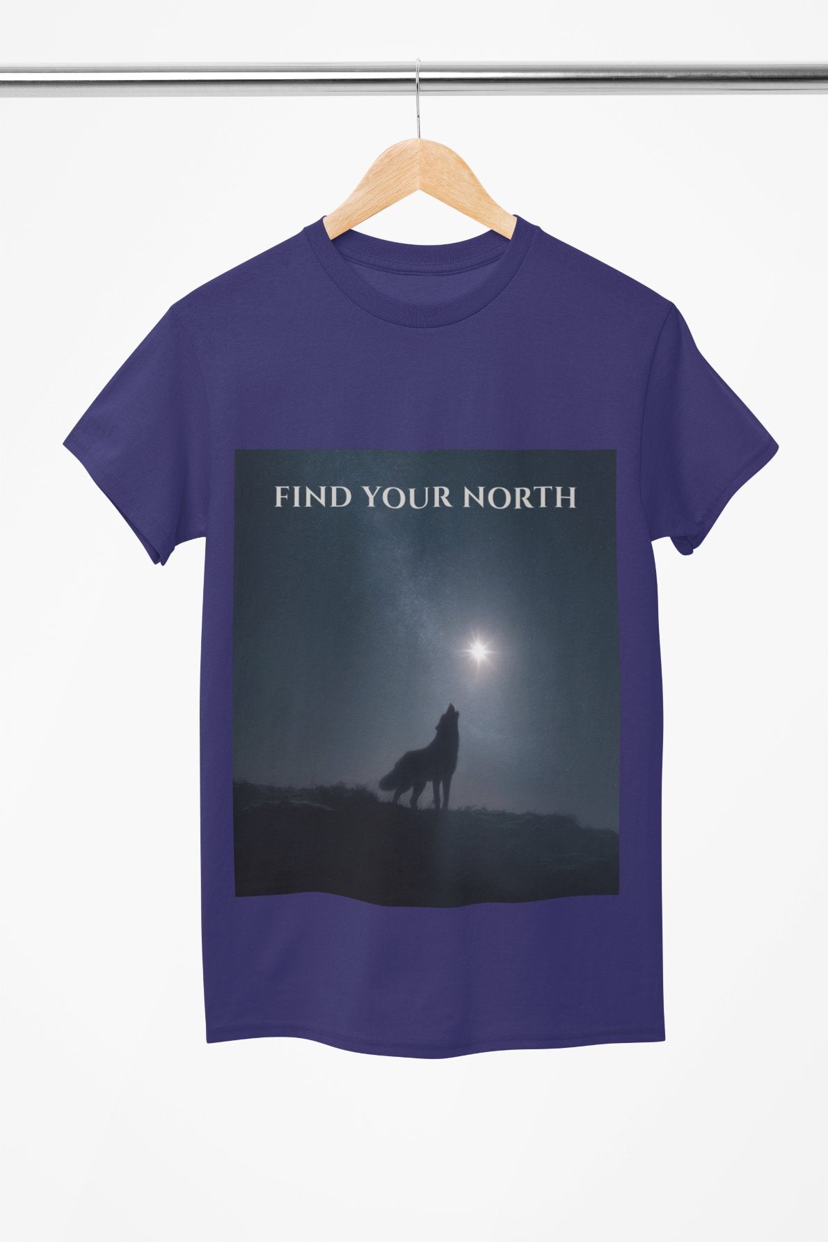 Blue t-shirt with a wolf graphic and 'Find Your North' text on a hanger.